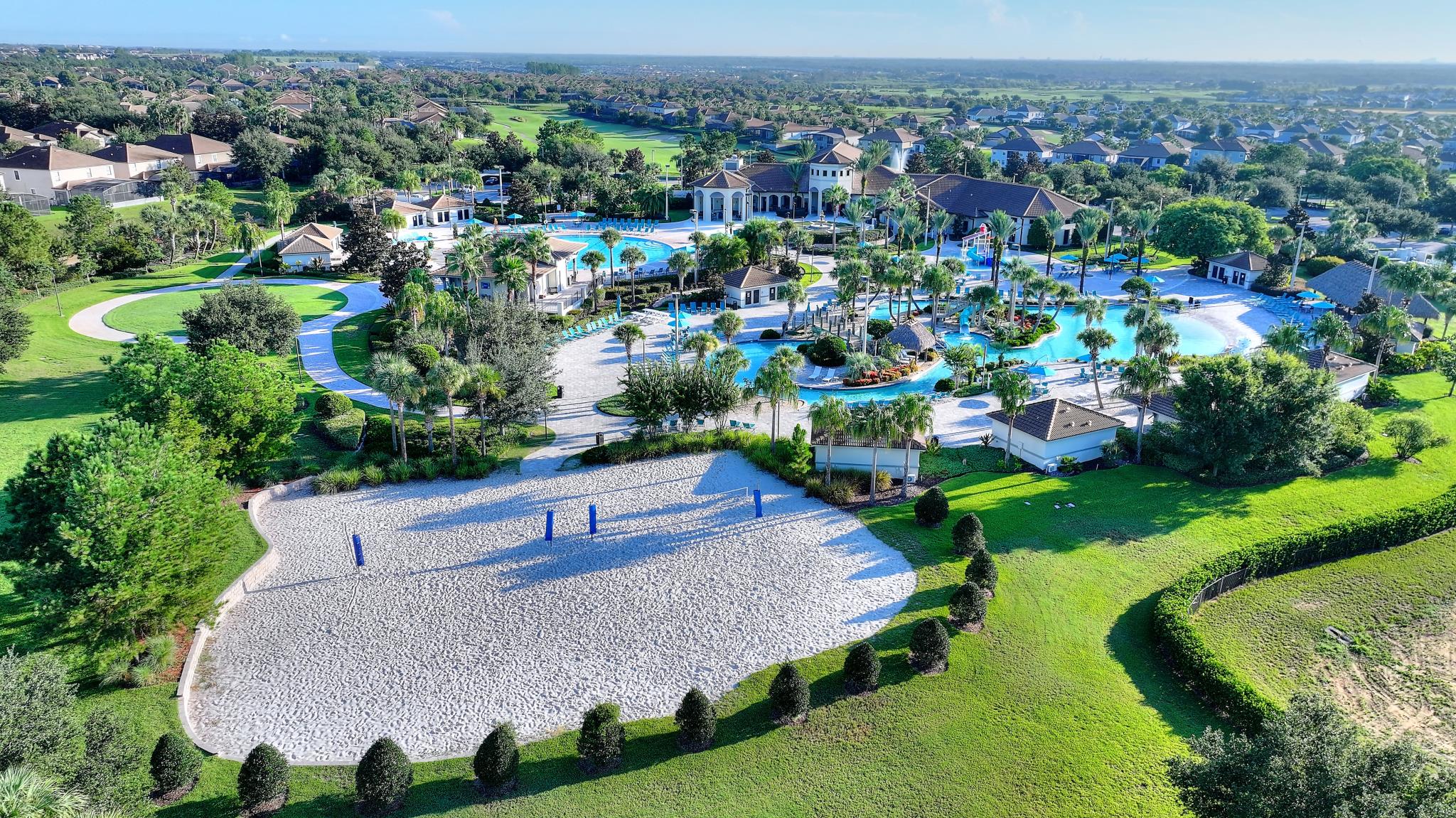 Waterslides and a lazy river at a ChampionsGate resort clubhouse pool in Davenport, Florida