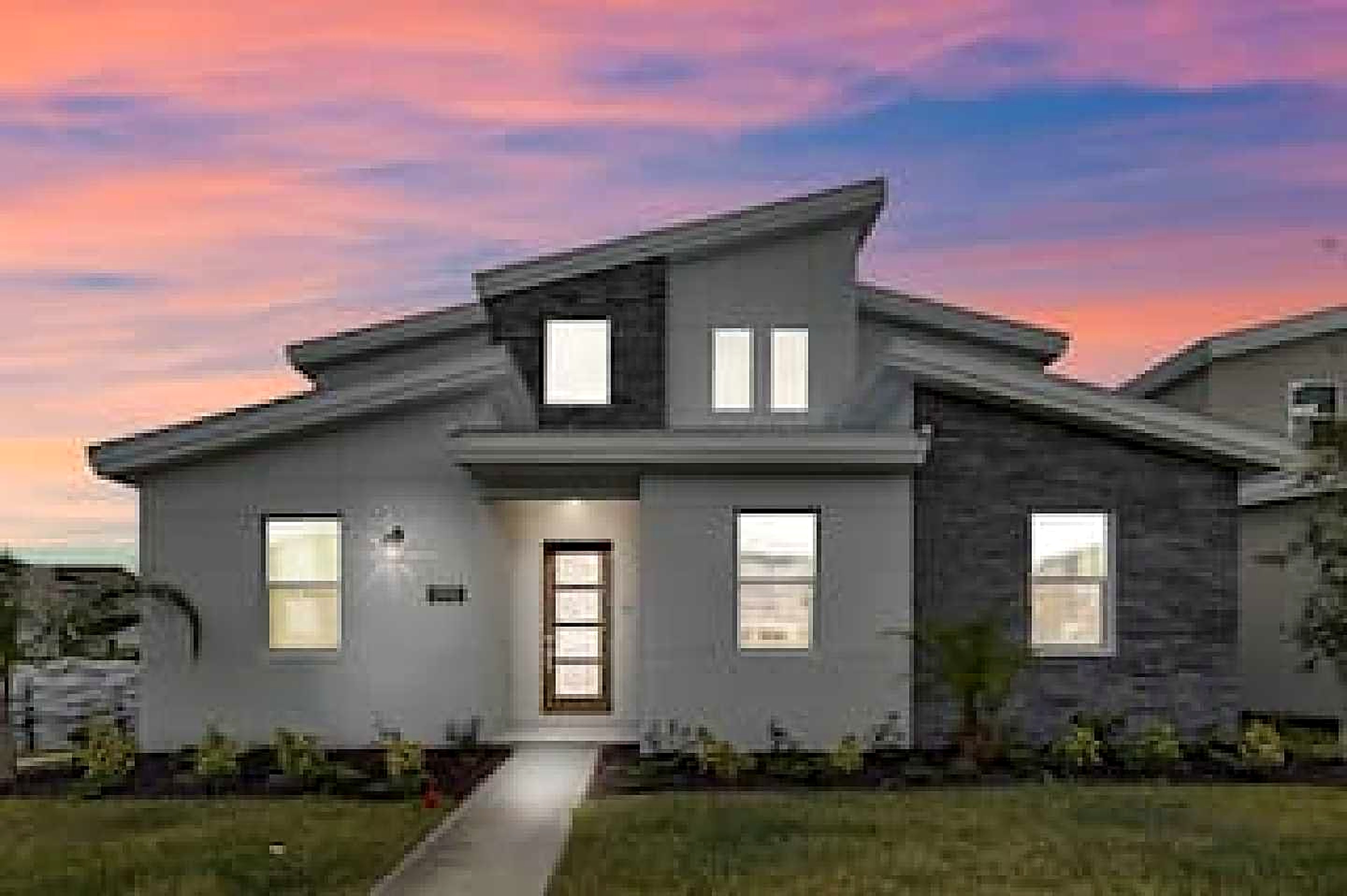 A ChampionsGate villa glowing at dusk, with themed bedrooms and a cinema room waiting inside